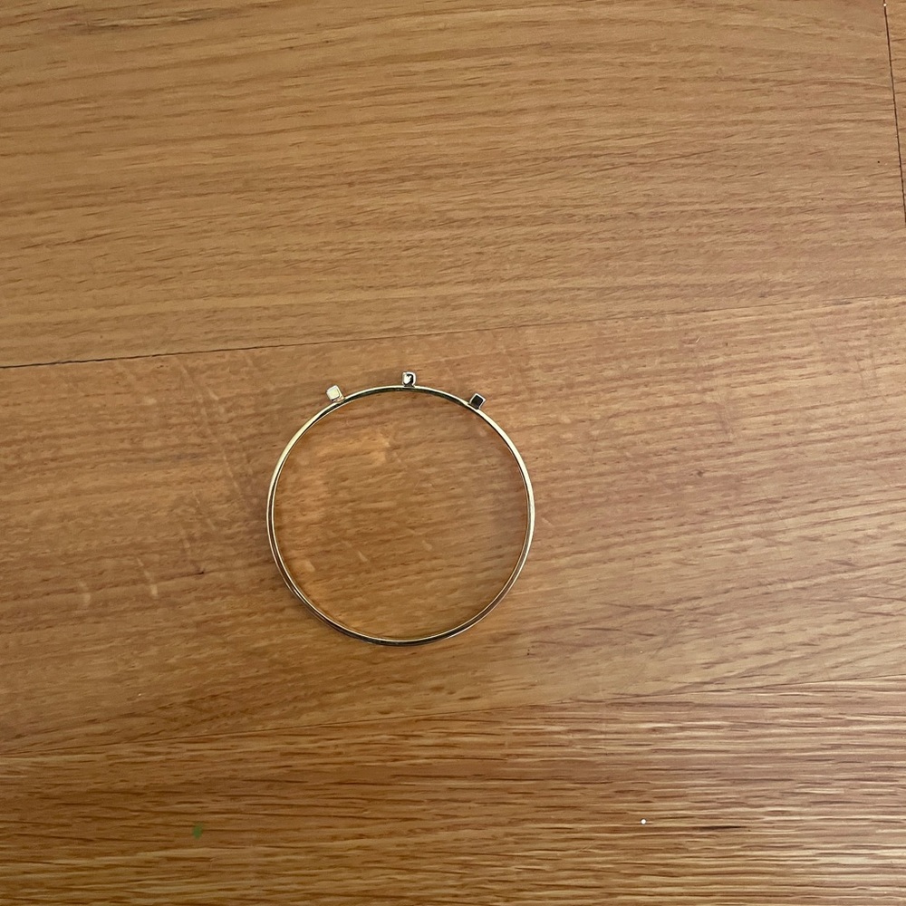 Custom gold bracelet.